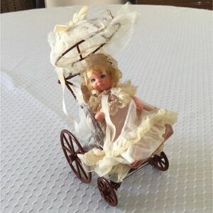 Rosebud Vintage Doll with Cream Lace Dress and Brown Stroller